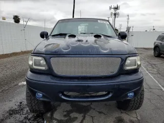2002 Ford F-150 с VIN 1FTPX17L02NA71656, выставлен на аукционе Copart как лот 49182185 с пробегом 49 745 миль миль и Списание • Salvage title. История ставок и продаж доступна на DreamBid. Изображение 5.