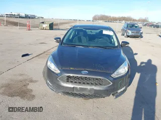 2016 Ford Focus SE with VIN 1FADP3F27GL374188, listed as a IAAI auction lot 41738121 with 125,229 mi miles. Bid and sale history available at carsss.com. Image 6.