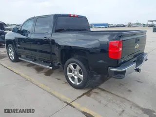 2018 Chevrolet Silverado 1500 LT with VIN 3GCPCREC5JG557884, listed as a IAAI auction lot 41889798 with 112,668 mi miles. Bid and sale history available at carsss.com. Image 3.