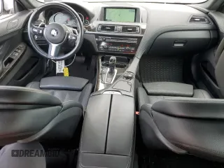 2015 BMW 6 Series 640i xDrive z VIN WBA6B8C53FD453229, wystawiony jako Copart lot #60371214 z przebiegiem 116 624 mil mil oraz Szkoda całkowita • Salvage title. Historia ofert i sprzedaży dostępna na DreamBid. Obrazek 8.