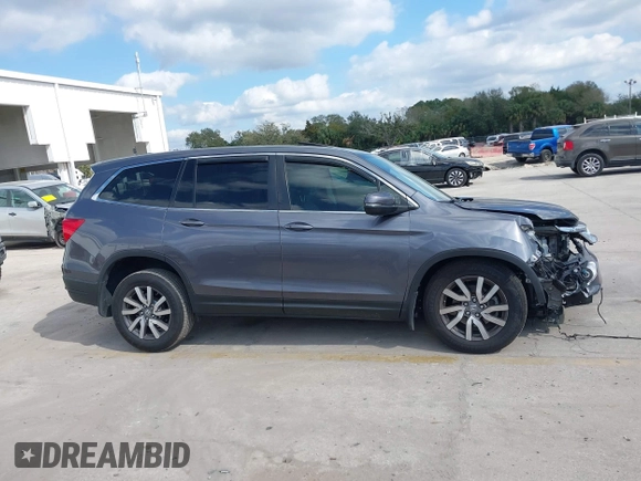 2020 Honda Pilot EX-L with VIN 5FNYF5H59LB014497, listed as a IAAI auction lot 41527415 with 66,625 mi miles. Bid and sale history available at carsss.com. Image 14.