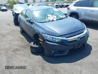 2018 Honda Civic EX-T z VIN JHMFC1F35JX032717, wystawiony jako IAAI lot #42465706 z przebiegiem 61 452 mil mil oraz . Historia ofert i sprzedaży dostępna na DreamBid. Obrazek 1.