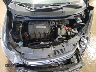 2011 Honda Insight LX z VIN JHMZE2H54BS009715, wystawiony jako Copart lot #48790825 z przebiegiem 219 867 mil mil oraz Szkoda całkowita • Salvage title. Historia ofert i sprzedaży dostępna na DreamBid. Obrazek 11.