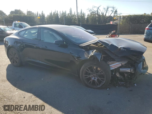 2022 Tesla Model S with VIN 5YJSA1E59NF460010, listed as a Copart auction lot 42797455 with Not provided miles and Salvage title. Bid and sale history available at DreamBid. Image 4.