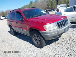 2002 Jeep Grand Cherokee with VIN 1J4GW38N22C258112, listed as a IAAI auction lot 41738093 with 253,226 mi miles and . Bid and sale history available at DreamBid. Image 1.