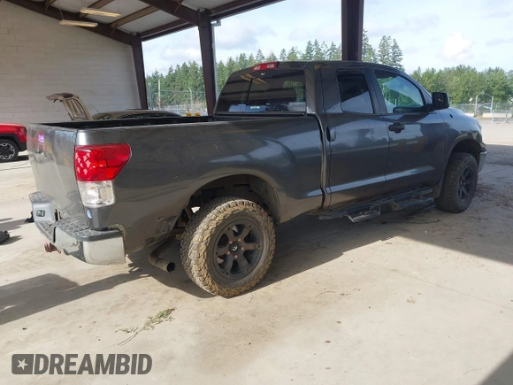 2012 Toyota Tundra with VIN 5TFUY5F13CX259312, listed as a IAAI auction lot 42547918 with 182,190 mi miles and . Bid and sale history available at DreamBid. Image 4.