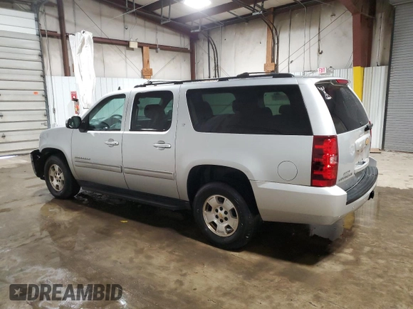 2013 Chevrolet Suburban LT with VIN 1GNSKJE76DR119873, listed as a Copart auction lot 53239445 with 197,172 mi miles and Salvage Title. Bid and sale history available at DreamBid. Image 2.