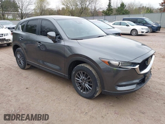 2020 Mazda CX-5 Touring with VIN JM3KFBCM2L0850855, listed as a IAAI auction lot 42147339 with 75,955 mi miles and . Bid and sale history available at carsss.com. Image 1.