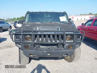 2003 Hummer H2 z VIN 5GRGN23UX3H140510, wystawiony jako IAAI lot #42325527 z przebiegiem 140 010 mil mil oraz . Historia ofert i sprzedaży dostępna na DreamBid. Obrazek 13.