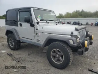 2004 Jeep Wrangler X with VIN 1J4FA39S74P724420, listed as a Copart auction lot 71839944 with 135,742 mi miles and Clean Title. Bid and sale history available at carsss.com. Image 4.