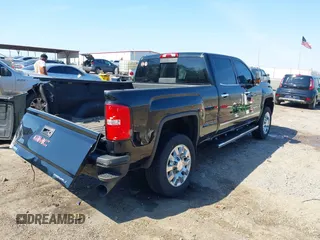 2019 GMC Sierra 2500HD Denali with VIN 1GT12SEY3KF207121, listed as a IAAI auction lot 38782753 with 87,337 mi miles. Bid and sale history available at carsss.com. Image 4.