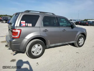 2010 Ford Escape XLT with VIN 1FMCU0DG6AKD05058, listed as a Copart auction lot 50449035 with 127,781 mi miles and Salvage Title. Bid and sale history available at carsss.com. Image 3.