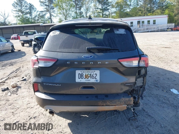 2020 Ford Escape Titanium Hybrid with VIN 1FMCU9DZ2LUA86600, listed as a IAAI auction lot 42059830 with 76,998 mi miles and . Bid and sale history available at DreamBid. Image 15.