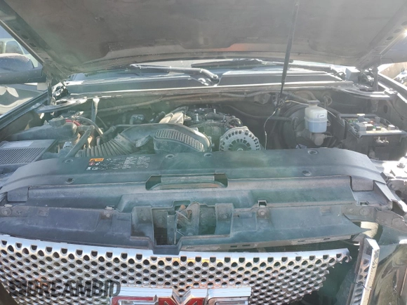 2014 GMC Yukon Denali z VIN 1GKS1EEF4ER230535, wystawiony jako Copart lot #76079844 z przebiegiem 153 180 mil mil oraz Szkoda całkowita • Salvage title. Historia ofert i sprzedaży dostępna na DreamBid. Obrazek 13.