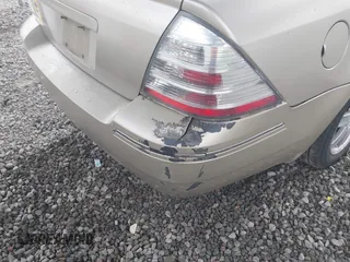 2005 Ford Five Hundred SE z VIN 1FAFP23145G127490, wystawiony jako IAAI lot #42122316 z przebiegiem 202 975 mil mil oraz . Historia ofert i sprzedaży dostępna na DreamBid. Obrazek 6.
