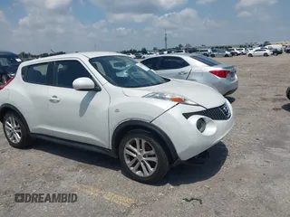 2013 Nissan Juke S with VIN JN8AF5MR2DT205370, listed as a IAAI auction lot 42055335 with 115,390 mi miles. Bid and sale history available at carsss.com. Image 1.
