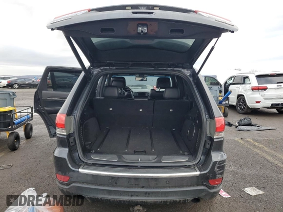 2014 Jeep Grand Cherokee Limited z VIN 1C4RJFBG6EC237437, wystawiony jako Copart lot #43224005 z przebiegiem 159 828 mil mil oraz Szkoda całkowita • Salvage title. Historia ofert i sprzedaży dostępna na DreamBid. Obrazek 6.