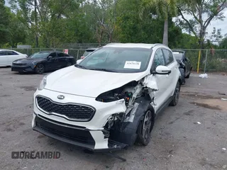 2021 Kia Sportage EX with VIN KNDPN3AC5M7856515, listed as a IAAI auction lot 41879128 with 56,537 mi miles and . Bid and sale history available at DreamBid. Image 6.