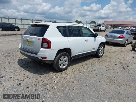 2016 Jeep Compass Sport with VIN 1C4NJCBA0GD742797, listed as a IAAI auction lot 42177186 with 128,665 mi miles and . Bid and sale history available at DreamBid. Image 4.