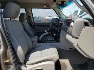 2006 Jeep Commander with VIN 1J8HH48K46C203109, listed as a Copart auction lot 65867435 with 191,804 mi miles and Salvage title. Bid and sale history available at DreamBid. Image 7.
