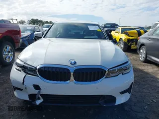 2022 BMW 3 Series 330i with VIN WBA5R1C01NFM20381, listed as a IAAI auction lot 41579020 with 37,874 mi miles. Bid and sale history available at carsss.com. Image 12.