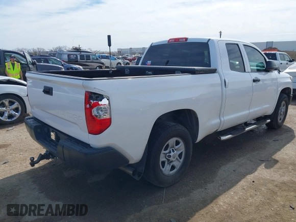 2019 Toyota Tundra SR with VIN 5TFRM5F15KX135882, listed as a IAAI auction lot 41681903 with 253,675 mi miles and . Bid and sale history available at DreamBid. Image 4.
