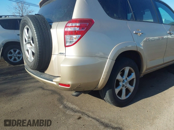 2010 Toyota RAV4 Ltd with VIN JTMDF4DV1A5020971, listed as a IAAI auction lot 41336888 with 214,838 mi miles. Bid and sale history available at carsss.com. Image 6.