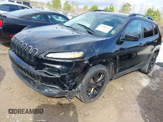 2017 Jeep Cherokee Altitude with VIN 1C4PJLAB7HW660624, listed as a IAAI auction lot 41488683 with 106,963 mi miles and . Bid and sale history available at DreamBid. Image 18.