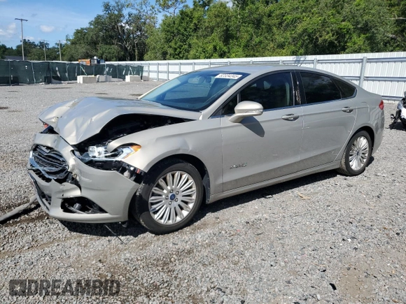 2015 Ford Fusion SE Hybrid z VIN 3FA6P0LU7FR102723, wystawiony jako Copart lot #62334345 z przebiegiem 136 341 mil mil oraz Nie do naprawy • Non repairable. Historia ofert i sprzedaży dostępna na DreamBid. Obrazek 1.