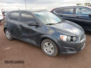 2014 Chevrolet Sonic LS with VIN 1G1JA6SH9E4139060, listed as a IAAI auction lot 41754207 with 89,890 mi miles and . Bid and sale history available at DreamBid. Image 1.