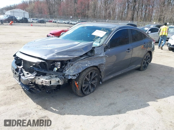 2020 Honda Civic Sedan Sport with VIN 2HGFC2F81LH511700, listed as a IAAI auction lot 41876533 with 79,610 mi miles. Bid and sale history available at carsss.com. Image 2.