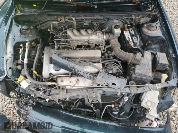 1996 Kia Sephia RS z VIN KNAFA1256T5265533, wystawiony jako Copart lot #48195555 z przebiegiem 225 062 mil mil oraz Szkoda całkowita • Salvage title. Historia ofert i sprzedaży dostępna na DreamBid. Obrazek 11.