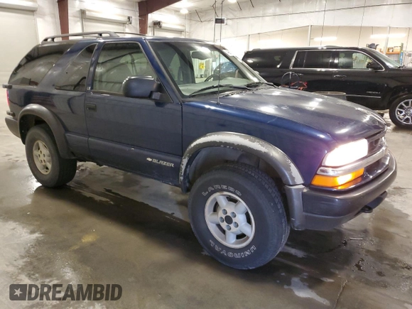 1999 Chevrolet Blazer LS с VIN 1GNCT18W9XK157387, выставлен на аукционе Copart как лот 49667765 с пробегом 182 411 миль миль и Списание • Salvage title. История ставок и продаж доступна на DreamBid. Изображение 4.