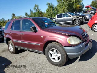 1999 Mercedes-Benz M-Class with VIN 4JGAB54E3XA140111, listed as a Copart auction lot 75031104 with 237,646 mi miles and Salvage Title. Bid and sale history available at carsss.com. Image 4.