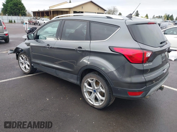 2019 Ford Escape Titanium with VIN 1FMCU9J99KUA64158, listed as a IAAI auction lot 41980102 with 52,514 mi miles. Bid and sale history available at carsss.com. Image 3.