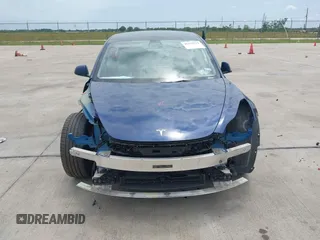 2022 Tesla Model 3 Long Range z VIN 5YJ3E1EB2NF246443, wystawiony jako IAAI lot #42179219 z przebiegiem Nie podano mil oraz . Historia ofert i sprzedaży dostępna na DreamBid. Obrazek 6.