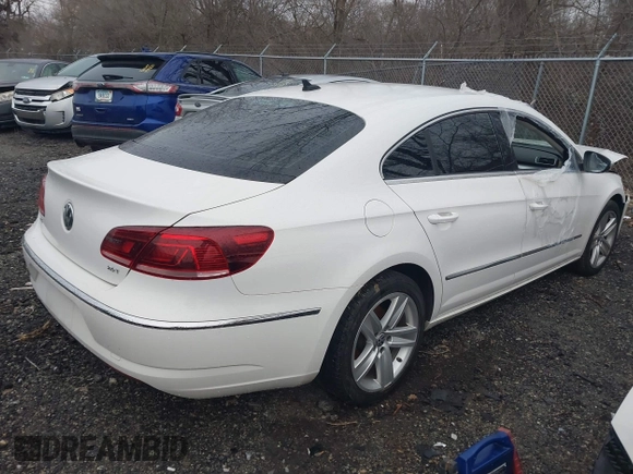 2014 Volkswagen CC Sport with VIN WVWBN7AN4EE505014, listed as a IAAI auction lot 41520345 with 140,422 mi miles and . Bid and sale history available at DreamBid. Image 4.