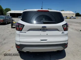 2017 Ford Escape SE z VIN 1FMCU0G9XHUC38315, wystawiony jako Copart lot #50998095 z przebiegiem 81 110 mil mil oraz Czysty tytuł • Clean title. Historia ofert i sprzedaży dostępna na DreamBid. Obrazek 6.