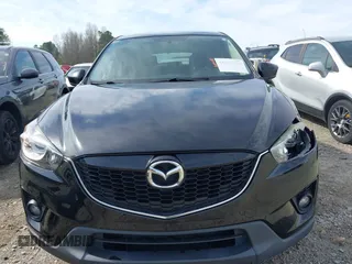 2014 Mazda CX-5 Touring with VIN JM3KE2CY9E0333951, listed as a IAAI auction lot 41825345 with 124,684 mi miles. Bid and sale history available at carsss.com. Image 12.
