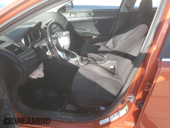 2011 Mitsubishi Lancer Ralliart with VIN JA32V6FV2BU041238, listed as a Copart auction lot 62651394 with 142,469 mi miles and Salvage Title. Bid and sale history available at DreamBid. Image 7.