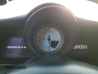 2016 Ferrari 488 z VIN ZFF79ALAXG0216223, wystawiony jako Copart lot #74210804 z przebiegiem Nie podano mil oraz Szkody całkowita. Historia ofert i sprzedaży dostępna na DreamBid. Obrazek 9.