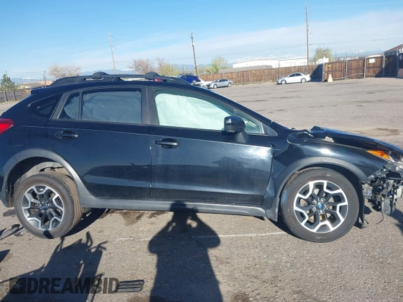 2016 Subaru Crosstrek Premium z VIN JF2GPABC4G8263841, wystawiony jako IAAI lot #42059013 z przebiegiem Nie podano mil oraz . Historia ofert i sprzedaży dostępna na DreamBid. Obrazek 14.