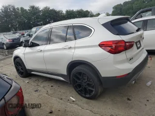 2019 BMW X1 xDrive28i with VIN WBXHT3C52K3H34021, listed as a Copart auction lot 64032535 with 30,752 mi miles and Salvage title. Bid and sale history available at DreamBid. Image 2.
