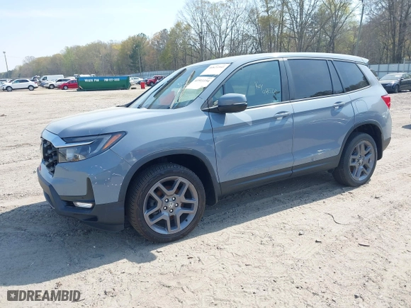 2022 Honda Passport EX-L with VIN 5FNYF8H51NB030262, listed as a IAAI auction lot 41911194 with 56,877 mi miles. Bid and sale history available at carsss.com. Image 16.