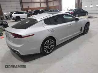 2018 Kia Stinger Premium with VIN KNAE25LA6J6021819, listed as a IAAI auction lot 41880827 with 119,214 mi miles. Bid and sale history available at carsss.com. Image 4.