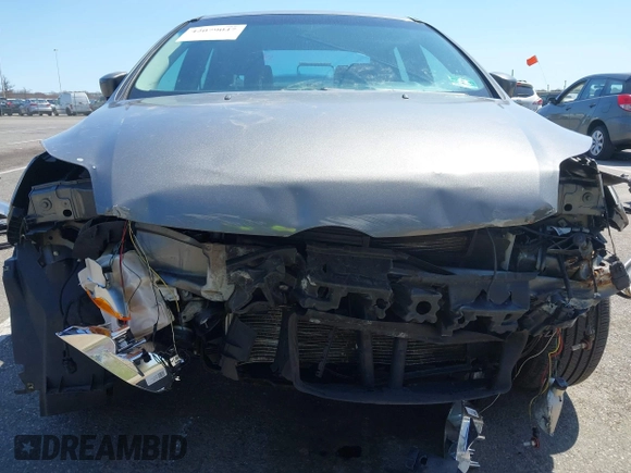 2012 Ford Focus SE with VIN 1FAHP3F25CL335319, listed as a IAAI auction lot 42079047 with 173,443 mi miles. Bid and sale history available at carsss.com. Image 5.