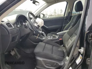 2016 Mazda CX-5 Touring with VIN JM3KE2CY1G0654434, listed as a Copart auction lot 48974115 with 83,977 mi miles and Salvage Title. Bid and sale history available at carsss.com. Image 7.