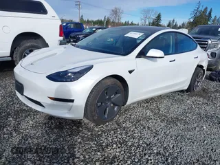 2021 Tesla Model 3 Standard Range Plus z VIN 5YJ3E1EAXMF871730, wystawiony jako IAAI lot #41794274 z przebiegiem 18 791 mil mil oraz . Historia ofert i sprzedaży dostępna na DreamBid. Obrazek 19.