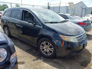 2011 Honda Odyssey EX-L with VIN 5FNRL5H62BB063125, listed as a IAAI auction lot 42562541 with 140,787 mi miles and . Bid and sale history available at DreamBid. Image 1.