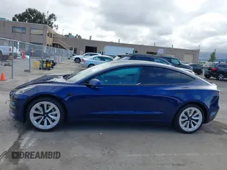 2021 Tesla Model 3 Standard Range Plus z VIN 5YJ3E1EA9MF020860, wystawiony jako IAAI lot #42246074 z przebiegiem 52 674 mil mil oraz . Historia ofert i sprzedaży dostępna na DreamBid. Obrazek 14.